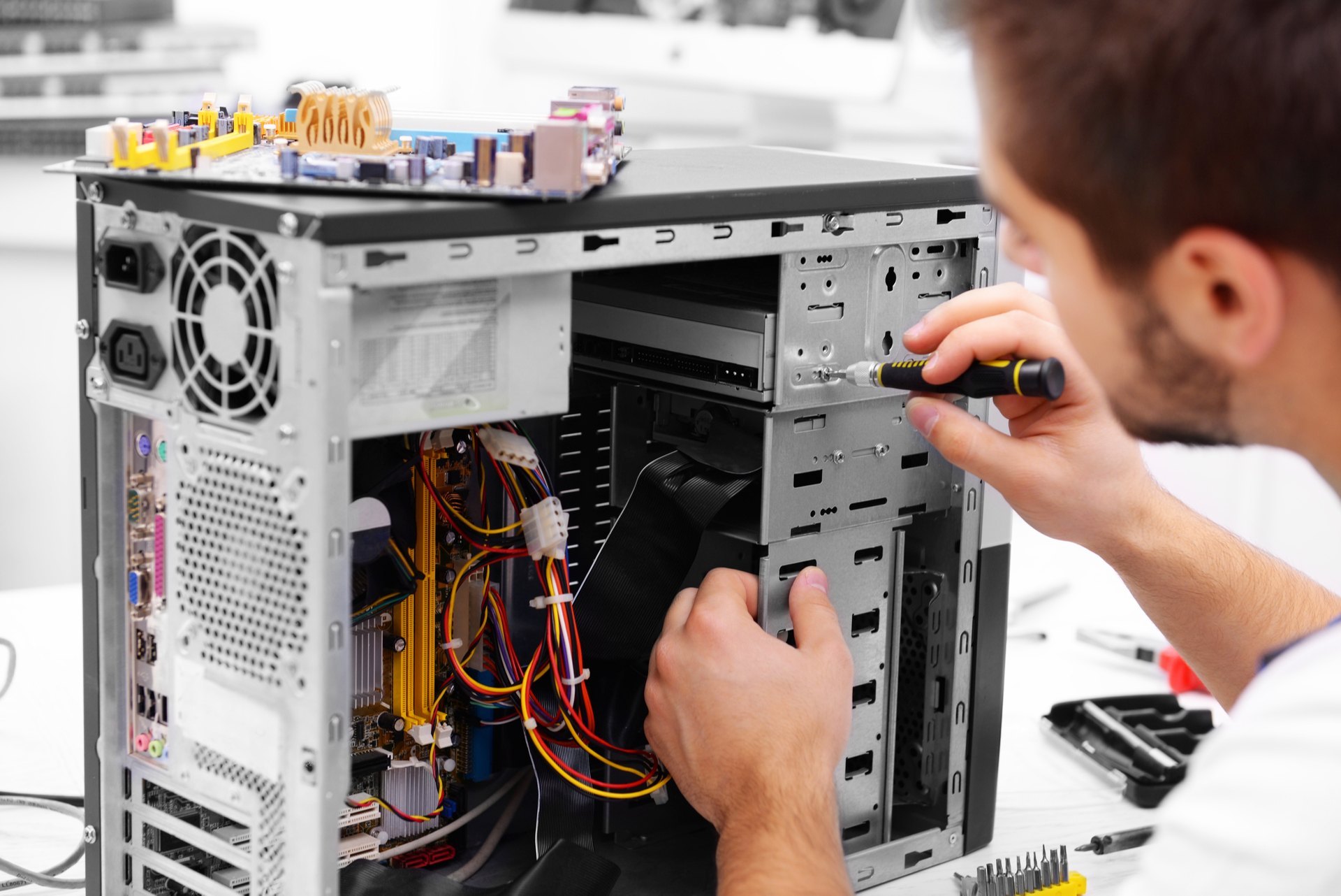 Technician repairing a workstation